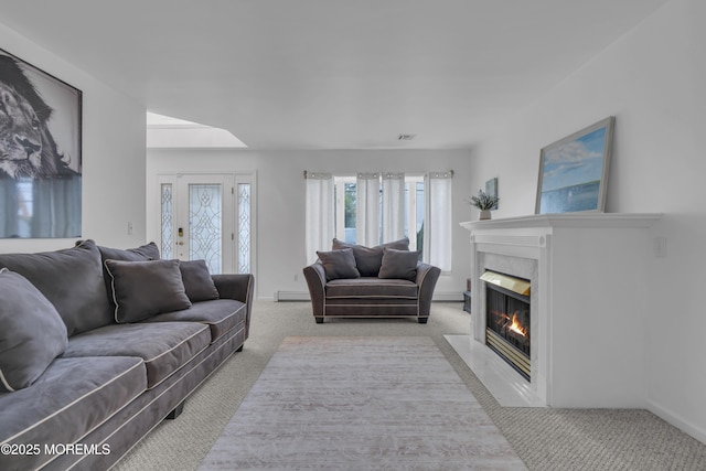 687 Princeton Ave, Brick, NJ 08724 - living area featuring carpet floors, a premium fireplace, a baseboard radiator, and baseboards