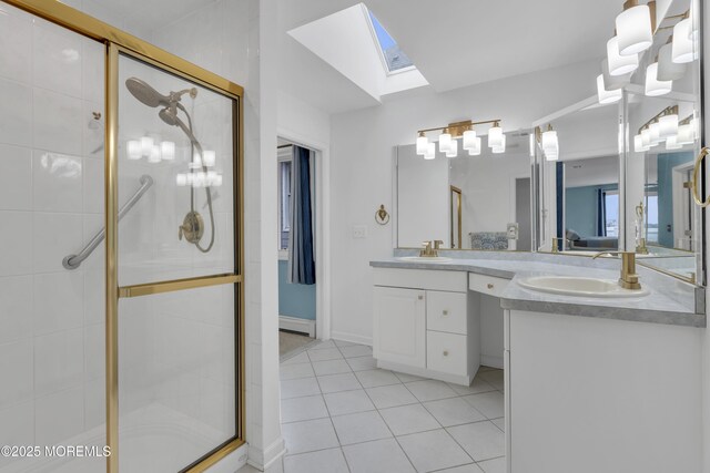 687 Princeton Ave, Brick, NJ 08724 - full bath featuring tile patterned floors, a stall shower, a skylight, and double vanity