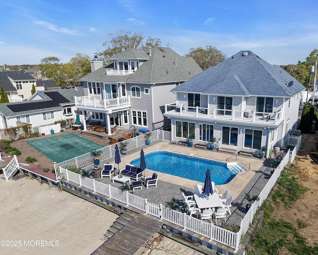 687 Princeton Ave, Brick, NJ 08724 - rear view of property with a balcony, a fenced backyard, a patio, and outdoor lounge area