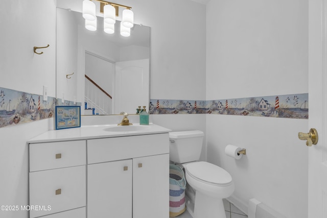 687 Princeton Ave, Brick, NJ 08724 - half bathroom with toilet, vanity, and tile patterned floors