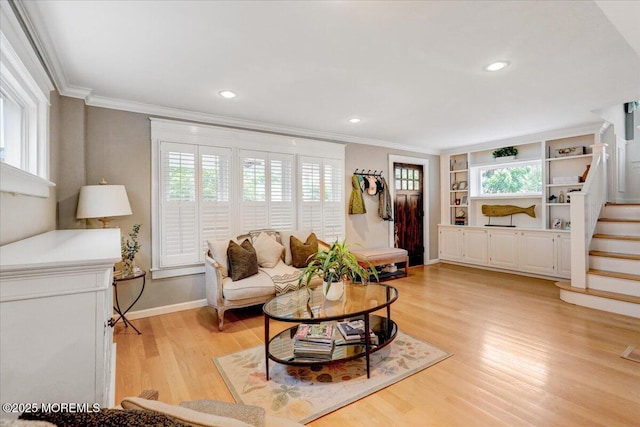 living area with light wood-type flooring, crown molding, stairway, baseboards, and recessed lighting