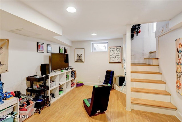 game room with wood finished floors, baseboards, and recessed lighting