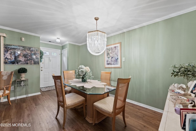 293 Gloucester Ct, Matawan, NJ 07747 - dining room featuring dark wood-style flooring, baseboards, a chandelier, and crown molding