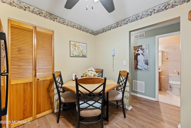 293 Gloucester Ct, Matawan, NJ 07747 - dining area with light wood-style flooring, a ceiling fan, and baseboards
