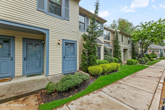 293 Gloucester Ct, Matawan, NJ 07747 - view of exterior entry with a residential view