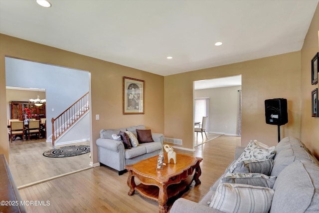 1041 Aumack Rd, Jackson, NJ 08527 - living room with a chandelier, light wood-style floors, baseboards, and recessed lighting