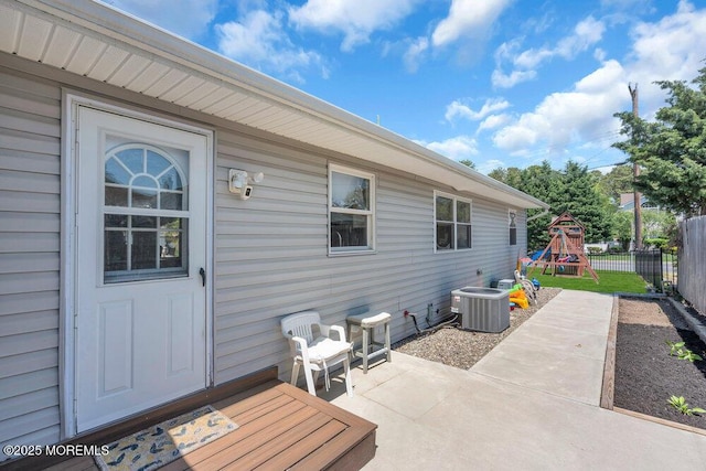 37 Bimini Rd, Brick, NJ 08723 - view of patio featuring cooling unit, a playground, and fence