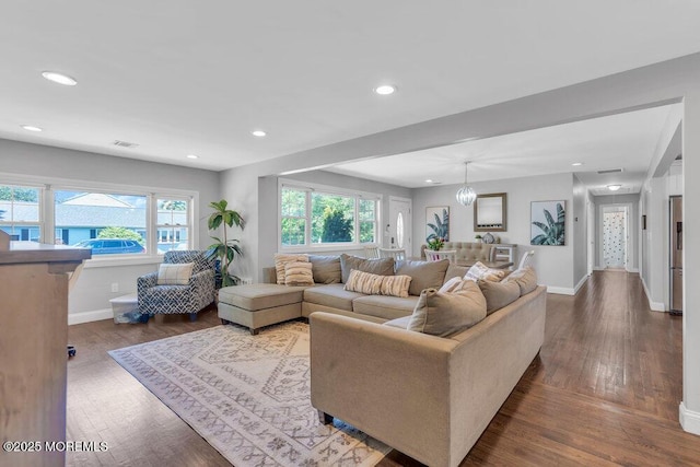 37 Bimini Rd, Brick, NJ 08723 - living room with baseboards, recessed lighting, healthy amount of natural light, wood finished floors, and a chandelier