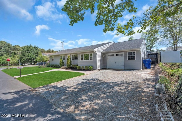 37 Bimini Rd, Brick, NJ 08723 - ranch-style house with an attached garage and gravel driveway