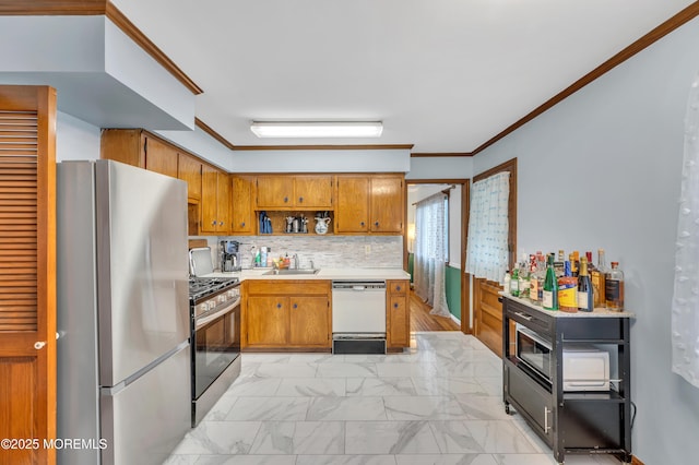 kitchen with stainless steel appliances, a sink, light marble finish flooring, light countertops, and brown cabinetry