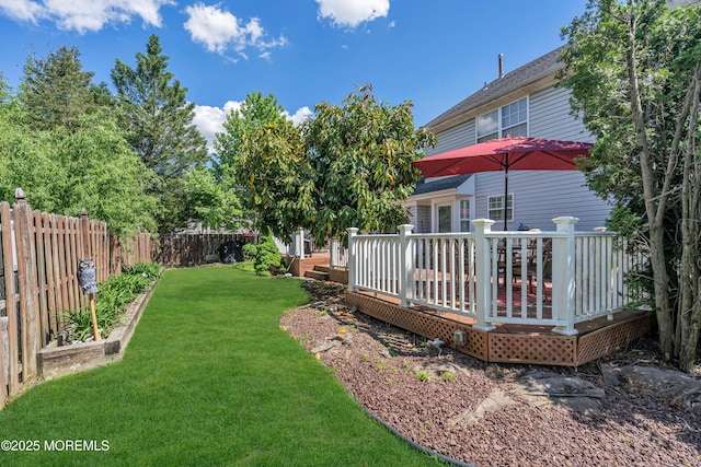 view of yard with a deck