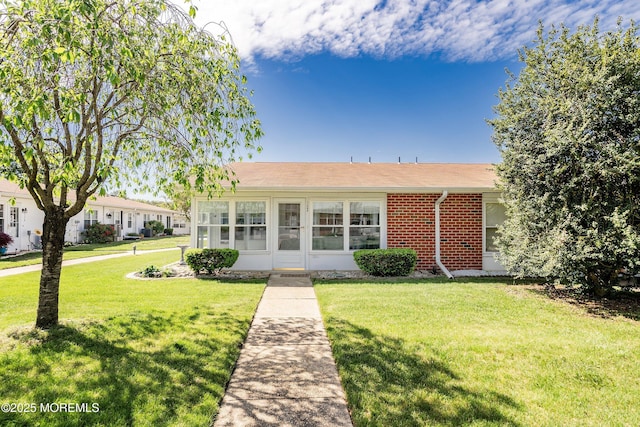 1154A Argyll Cir, Lakewood, NJ 08701 - ranch-style house featuring brick siding and a front yard