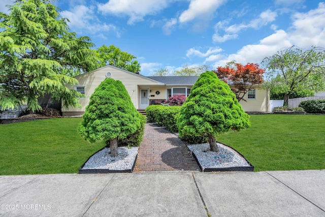view of front of house with a front lawn