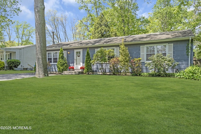 2465 Woodland Rd, Manchester, NJ 08759 - view of front of house with a front lawn