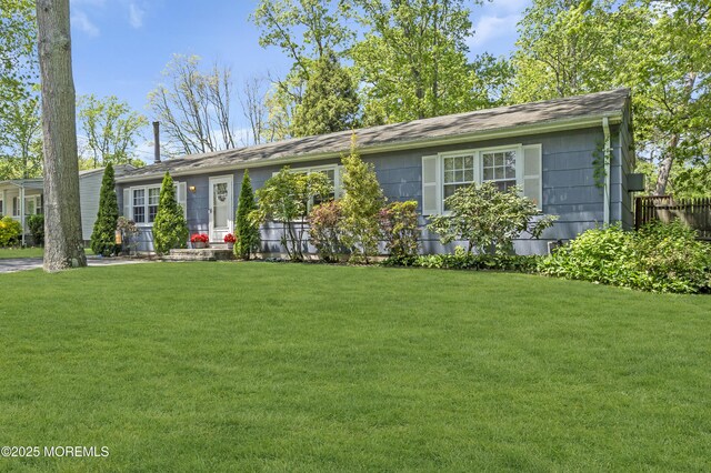 2465 Woodland Rd, Manchester, NJ 08759 - ranch-style home with a front yard and roof with shingles