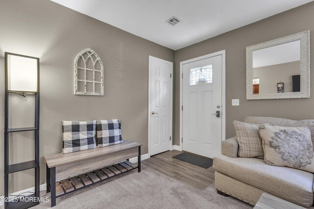 2465 Woodland Rd, Manchester, NJ 08759 - carpeted entrance foyer featuring baseboards