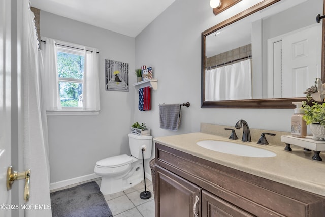 2465 Woodland Rd, Manchester, NJ 08759 - bathroom featuring tile patterned floors, toilet, vanity, and baseboards