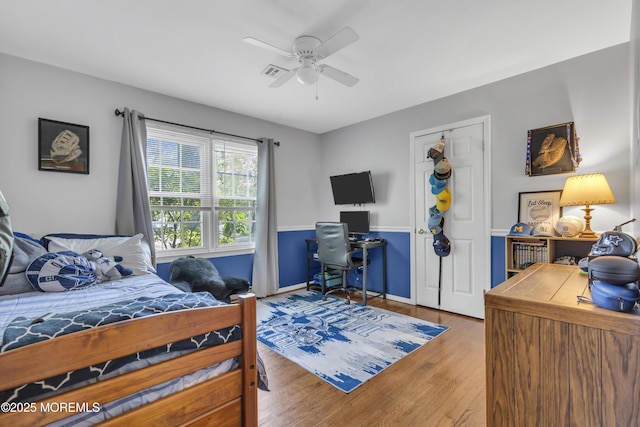 2465 Woodland Rd, Manchester, NJ 08759 - bedroom with an office area, wood finished floors, ceiling fan, and baseboards