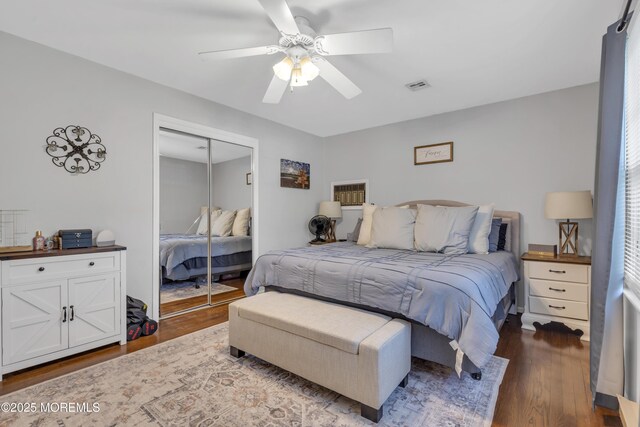 2465 Woodland Rd, Manchester, NJ 08759 - bedroom with wood finished floors, ceiling fan, and a closet