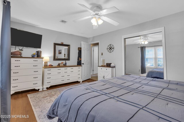 2465 Woodland Rd, Manchester, NJ 08759 - bedroom with wood finished floors, a ceiling fan, and a closet