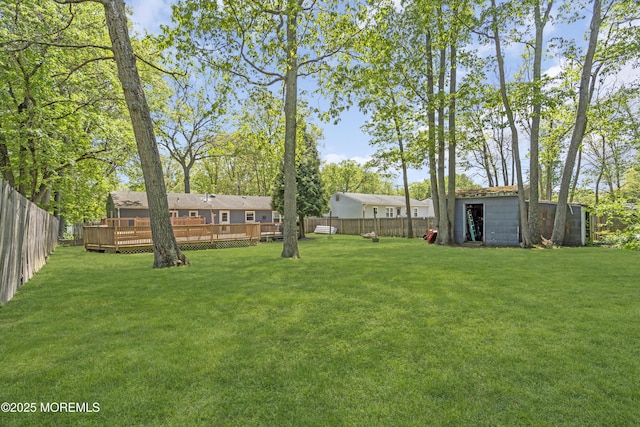 2465 Woodland Rd, Manchester, NJ 08759 - view of yard with a storage shed, a wooden deck, and an outdoor structure