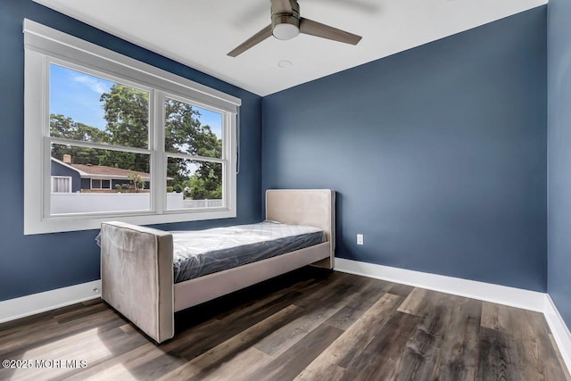 523 Norwood Ave, Long Branch, NJ 07740 - bedroom with baseboards, wood finished floors, and a ceiling fan