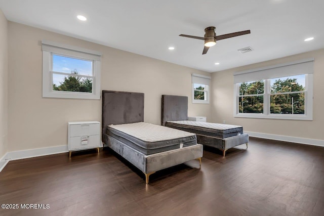 523 Norwood Ave, Long Branch, NJ 07740 - bedroom with multiple windows, baseboards, dark wood finished floors, and recessed lighting
