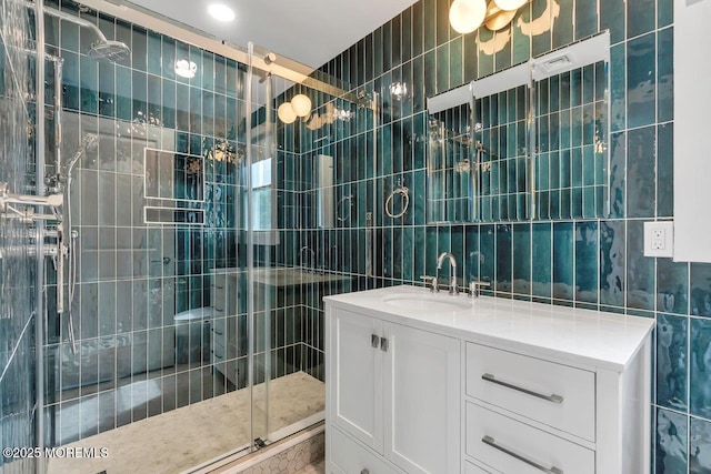 523 Norwood Ave, Long Branch, NJ 07740 - full bathroom featuring tile walls, a shower stall, and vanity