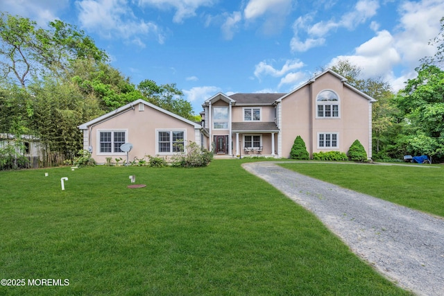 1042 Maxim Southard Rd, Howell, NJ 07731 - traditional home featuring stucco siding and a front yard