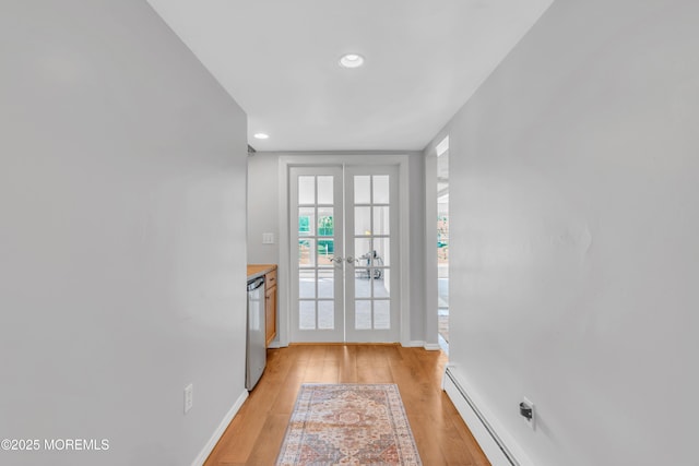 1042 Maxim Southard Rd, Howell, NJ 07731 - entryway featuring french doors, light wood-style floors, baseboard heating, baseboards, and recessed lighting