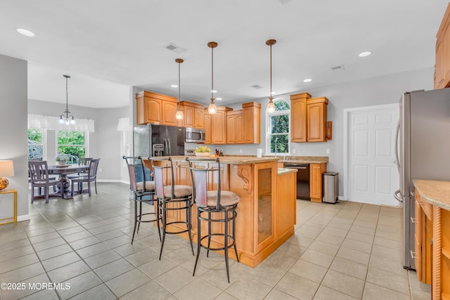 1042 Maxim Southard Rd, Howell, NJ 07731 - kitchen featuring stainless steel appliances, a center island, baseboards, a kitchen breakfast bar, and recessed lighting