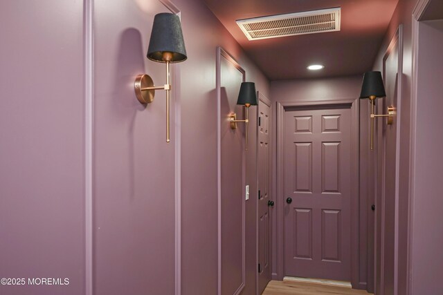 hall featuring recessed lighting and light wood-type flooring