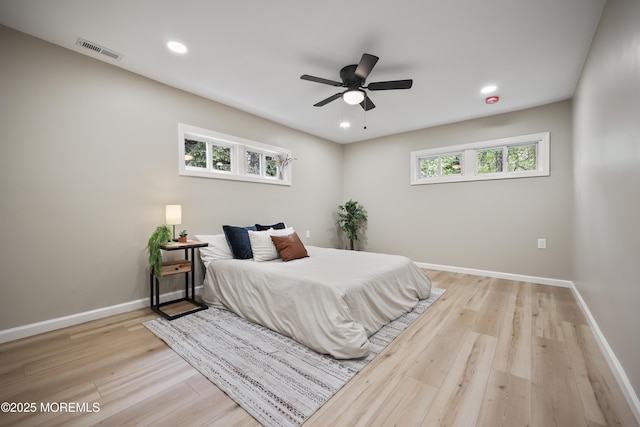 bedroom featuring light wood-style flooring, baseboards, recessed lighting, and ceiling fan