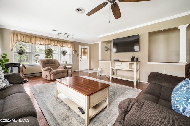 17B Drake St, Whiting, NJ 08759 - living area with wood finished floors, a baseboard radiator, a ceiling fan, ornamental molding, and baseboards