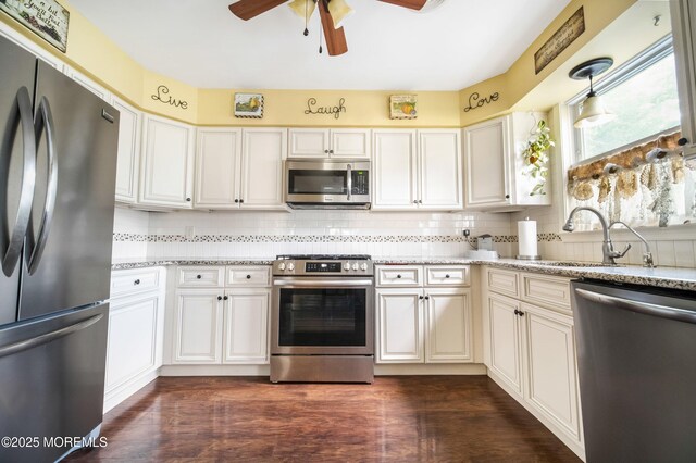17B Drake St, Whiting, NJ 08759 - kitchen featuring stainless steel appliances, ceiling fan, decorative backsplash, light stone countertops, and a sink