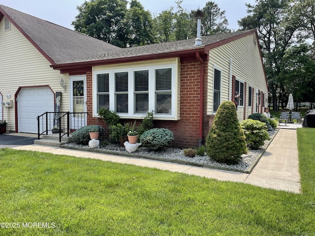 17B Drake St, Whiting, NJ 08759 - view of front of house with brick siding, roof with shingles, a front yard, and asphalt driveway