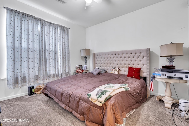 bedroom with carpet, baseboards, and ceiling fan