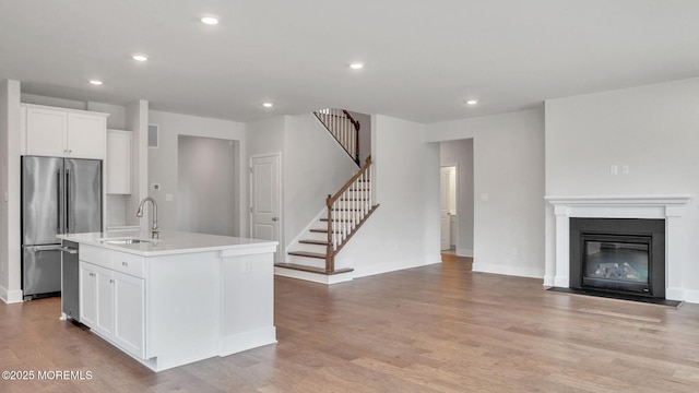 15 Hulse Landing Rd, Brick, NJ 08723 - kitchen with a sink, appliances with stainless steel finishes, recessed lighting, white cabinets, and an island with sink