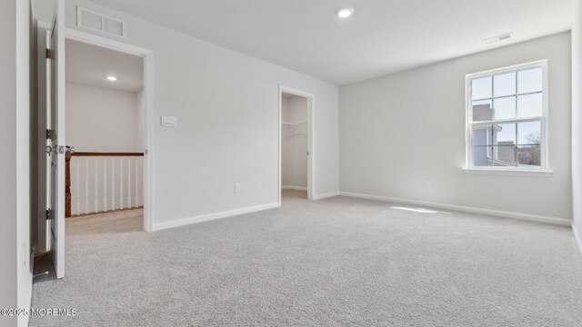 15 Hulse Landing Rd, Brick, NJ 08723 - unfurnished bedroom with carpet floors, baseboards, a walk in closet, and recessed lighting