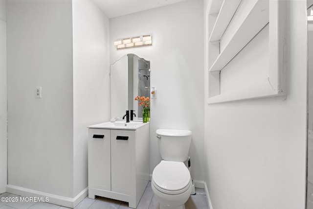 15 Lark Ln, Brick, NJ 08724 - bathroom with baseboards, toilet, vanity, and tile patterned flooring