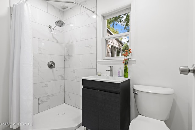 15 Lark Ln, Brick, NJ 08724 - bathroom featuring toilet, tiled shower, and vanity
