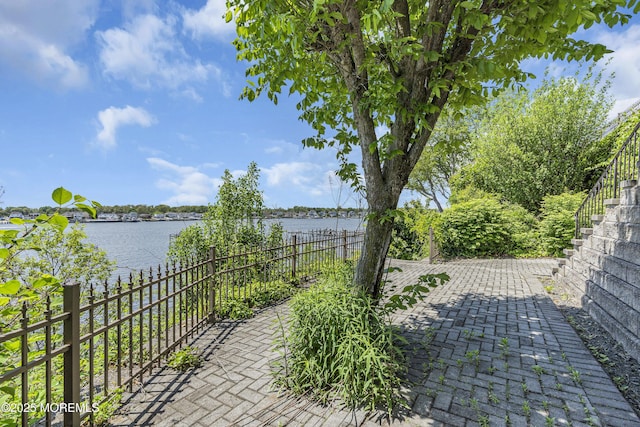 1015 Forrest Rd, Brielle, NJ 08730 - view of patio with a water view and fence