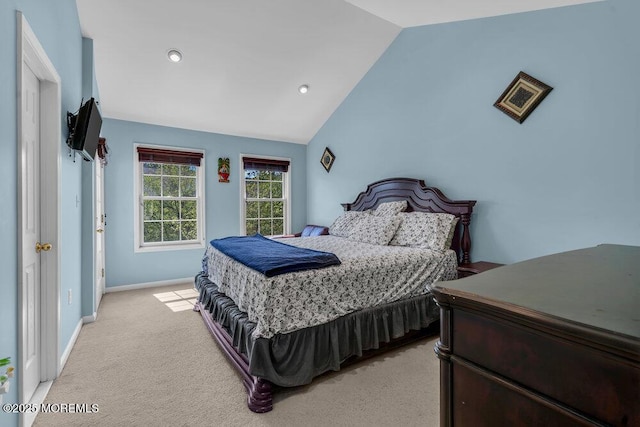 59 Inwood Dr, Manalapan, NJ 07726 - bedroom featuring lofted ceiling, light carpet, and baseboards