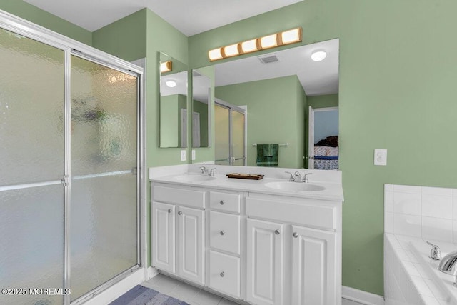 59 Inwood Dr, Manalapan, NJ 07726 - full bath featuring ensuite bathroom, a garden tub, double vanity, and a shower with shower door