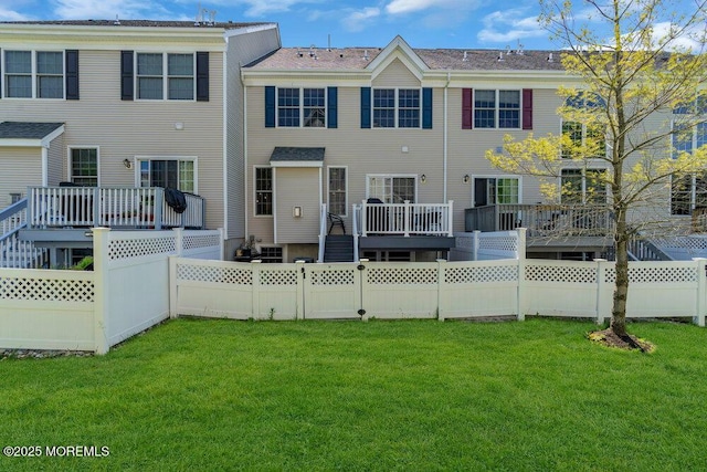 59 Inwood Dr, Manalapan, NJ 07726 - rear view of property featuring a deck