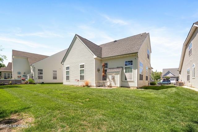 7 Salem Ct, Barnegat, NJ 08005 - rear view of house featuring a lawn, central AC, and a shingled roof