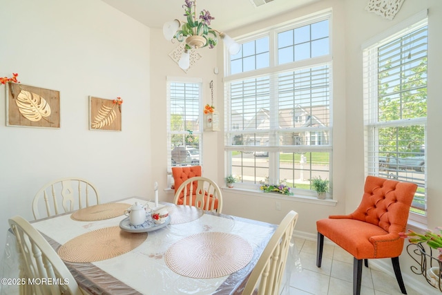 7 Salem Ct, Barnegat, NJ 08005 - tiled dining area featuring plenty of natural light and baseboards