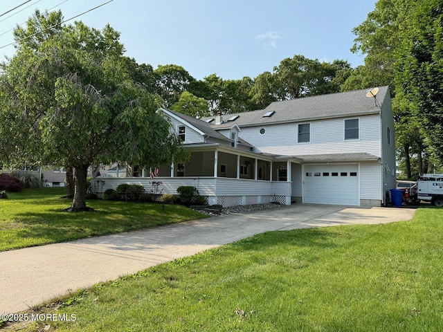 57 Garden Ave, Island Heights, NJ 08732 - view of front facade featuring a garage, a front yard, and driveway