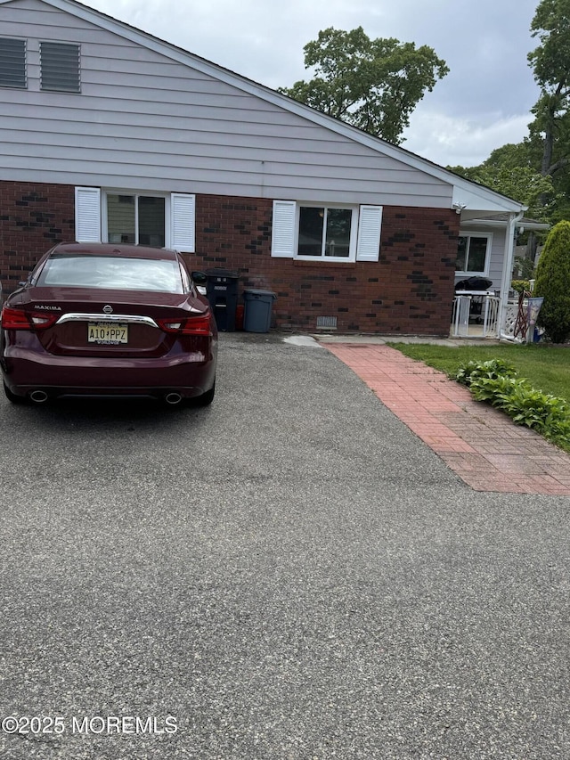 16B Robin St Unit 16B, Manchester, NJ 08759 - view of home's exterior with brick siding