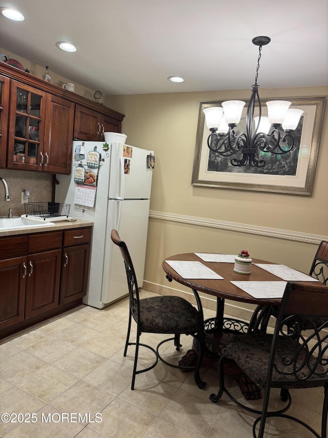 16B Robin St Unit 16B, Manchester, NJ 08759 - dining room featuring a chandelier, recessed lighting, and light tile patterned floors